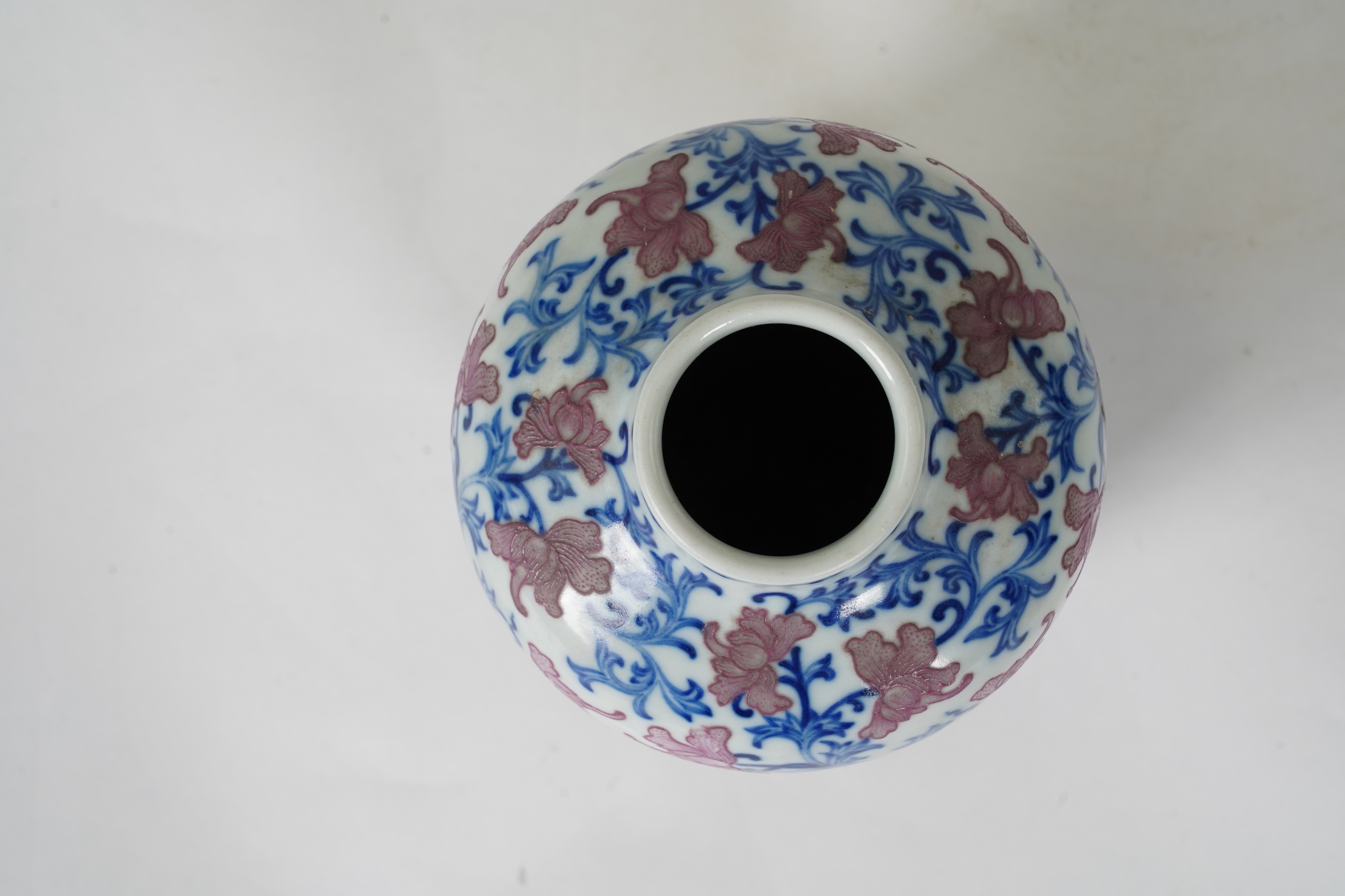 A Chinese pink enamelled and underglaze blue vase, six character Qianlong seal mark to base, possibly Republic period